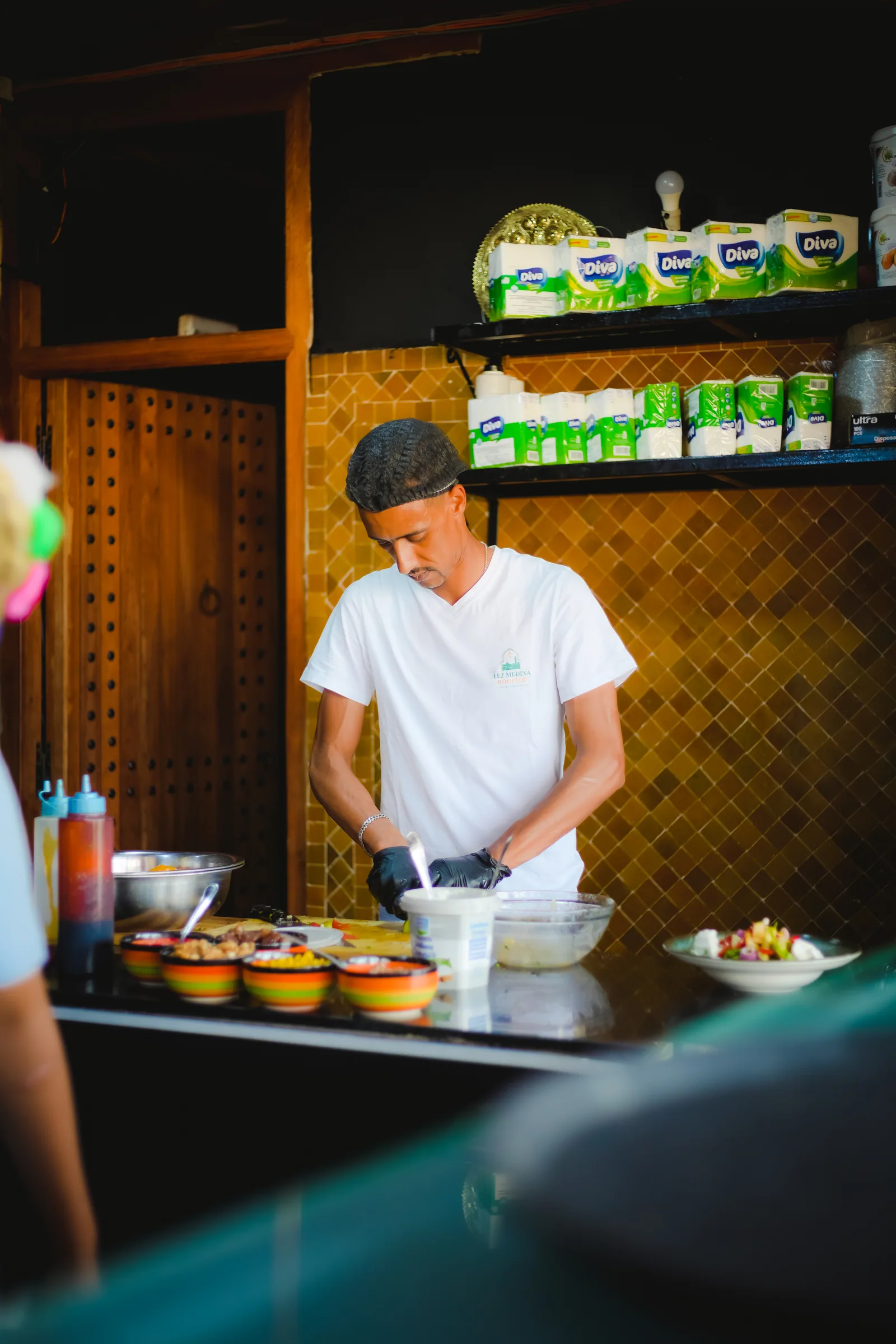 Chef preparing a dish in the kitchen