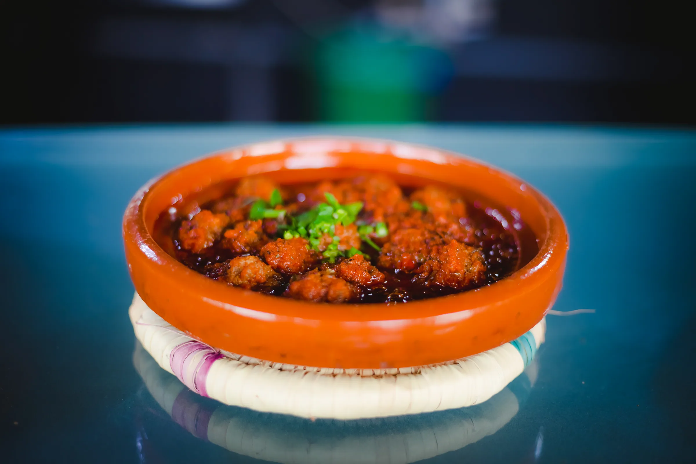 Moroccan dish presented in a clay tagine